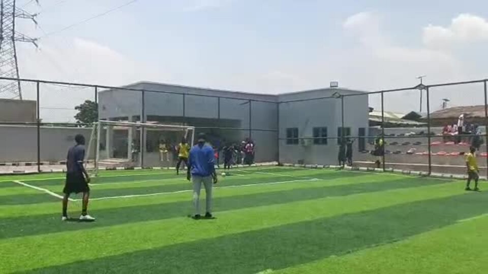 Adetola students playing football on the astroturf pitch